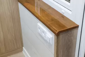 Отделка ламинатом Г-образного балкона с утеплением