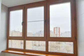 Отделка балкона ламинатом с остеклением