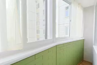 Пример работы: балкон с остеклением Slidors и отделкой ПВХ