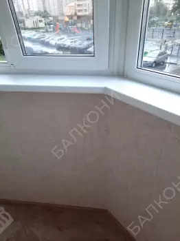 Остекление и отделка балкона Лодочка