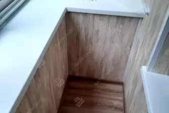 Холодное остекление и отделка П-образного балкона