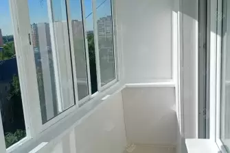 Остекление балкона и отделка стен