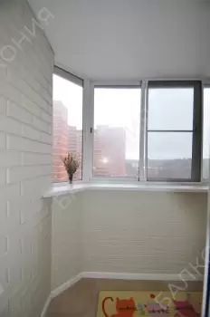 Отделка балкона Лодочка под ключ с холодным остеклением