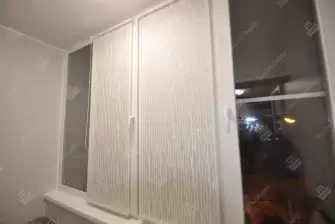Остекление балкона с отделкой