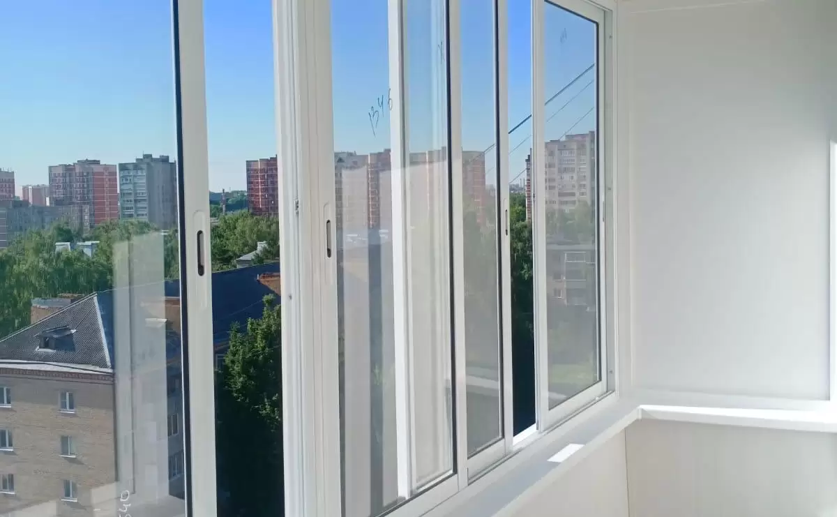 Остекление балкона и отделка стен